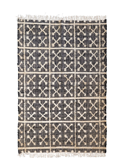 Julio, gewebter Sisal-Teppich 120x180 cm in braun und weiß gemustert. Verleiht deinem Wohnzimmer oder Schlafzimmer eine entspannte Urlaubsatmosphäre. Der Teppich bringt lässigen Freizeitlook und natürliche Eleganz in jeden Raum